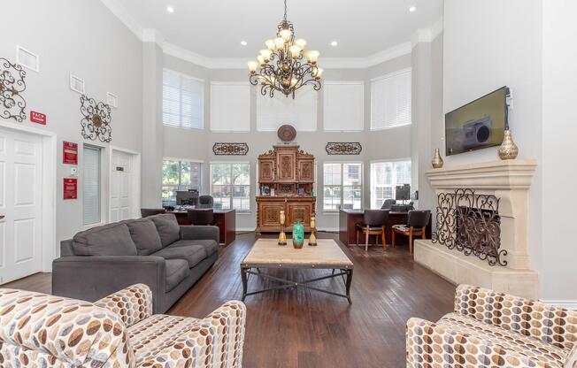 a living room filled with furniture and a fire place