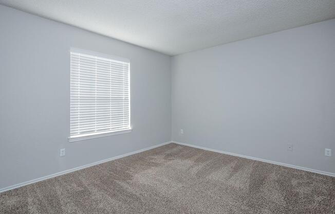 a room with a sink and a window