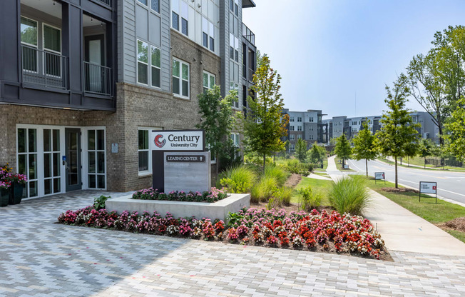 a building entrance with a sign that says canterburyat Century University City, North Carolina, 28213