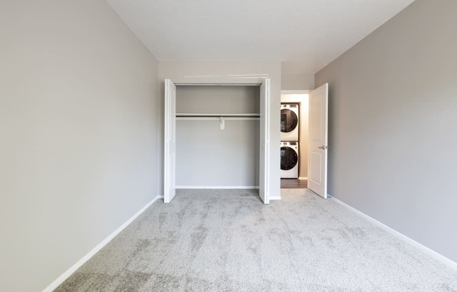 Second Bedroom with Closet in the Two Bedroom Two Bath Apartment at Woodbridge Apartments Bloomington