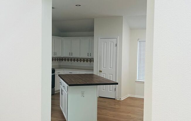 Updated Single-Story in Prime Location – Vinyl Hardwood Floors & Spacious Patio