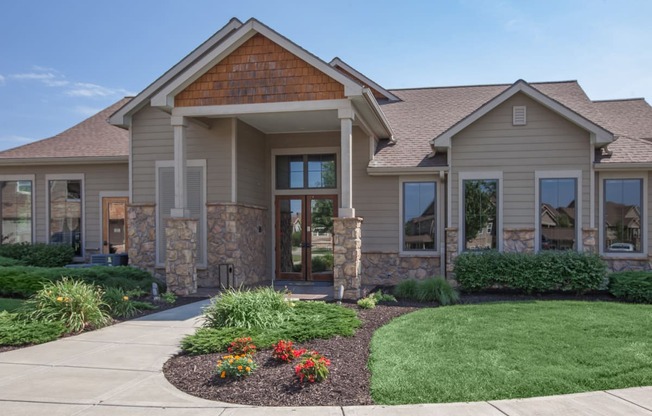 The exterior of the valley side cabana clubhouse with pretty landscaping.