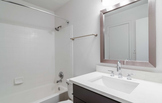 Bathroom with tub and shower combo