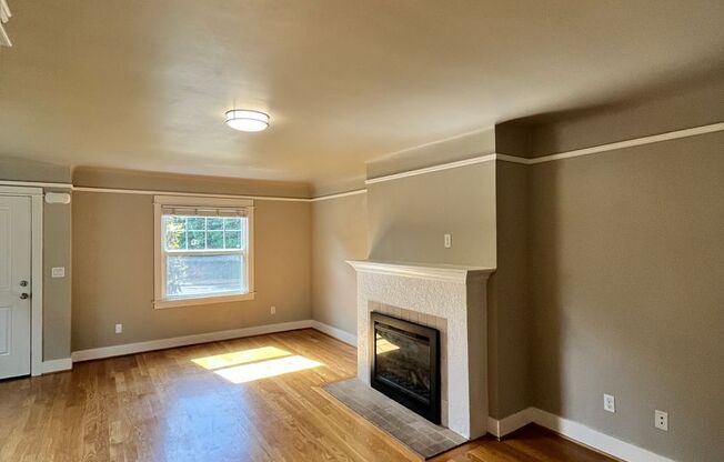 Gorgeous 2-Bedroom Townhome! Hardwood Floors, Private Basement, Garage & Fenced Backyard!