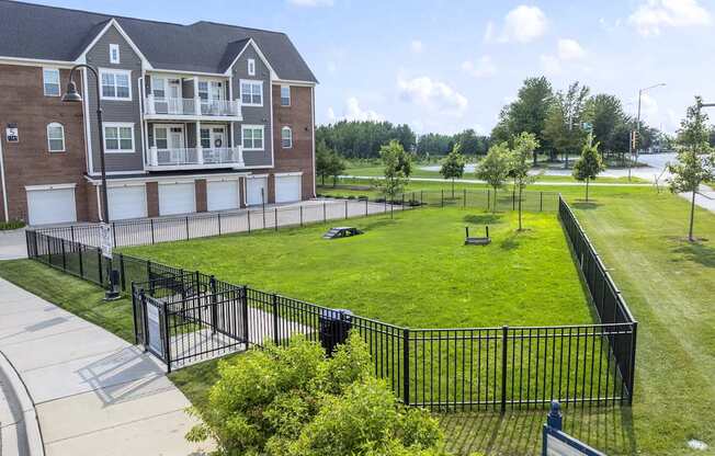 A large building with a sign that says D&P Apartments.