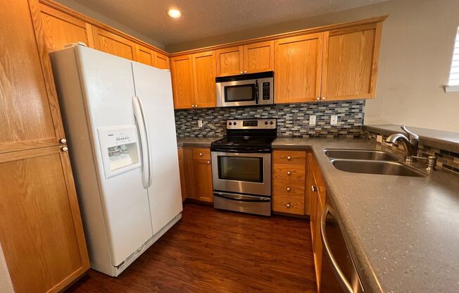 16895 NW Oak Creek Drive ~ Beautiful Bethany Home!