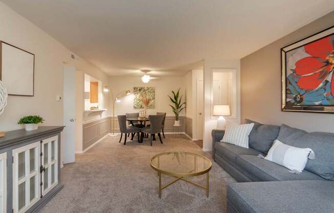 This is a photo of the dining area from the living room in the 822 square foot, 2 bedroom, 1 bath floor plan at Village East Apartments in Franklin, OH.