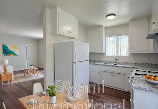 6100 11 AVE