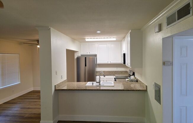 Special!! Newly renovated with new appliances 3 bedroom upstairs condo in gated community available now