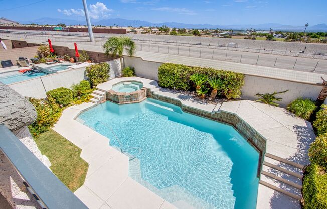 4 Bed 3 Bath Beautiful Home With STRIP VIEWS & POOL/SPA! Located in the heart of Summerlin.