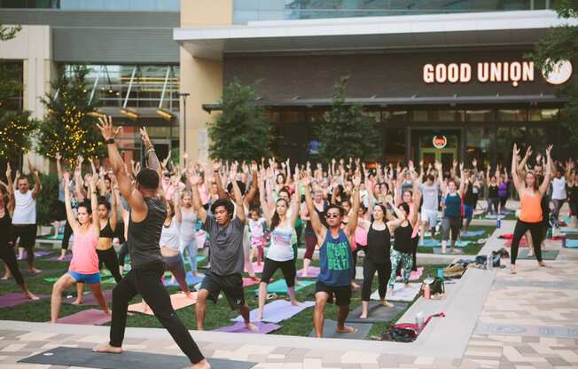 Reef Point's free yoga in the park every Saturday morning at 9 am at Windsor CityLine, Richardson, TX