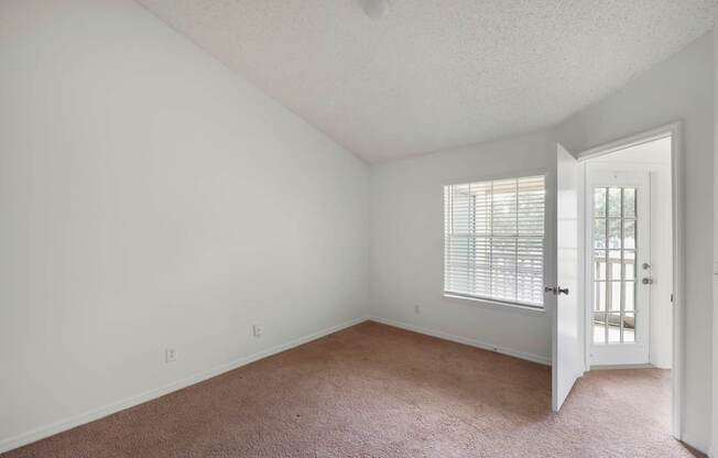 Model living room at Lake Tivoli Apartments in Kissimmee, FL