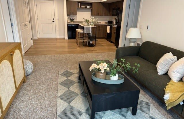 a living room with a couch and a coffee table