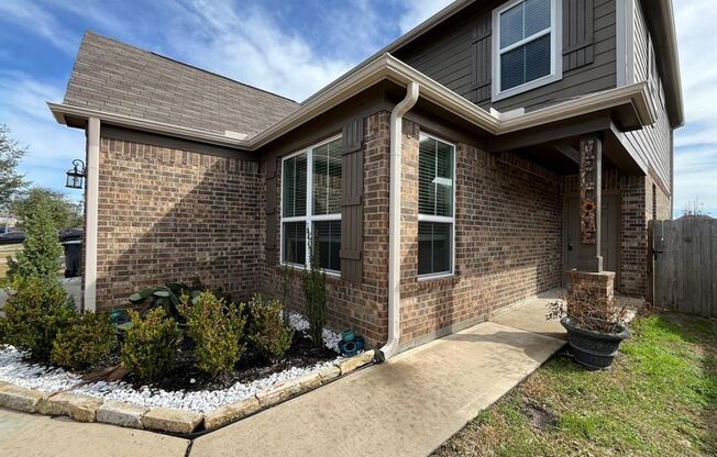 Modern Comfort 5-Bedroom 2-Story Brick Home with Spacious Living Areas