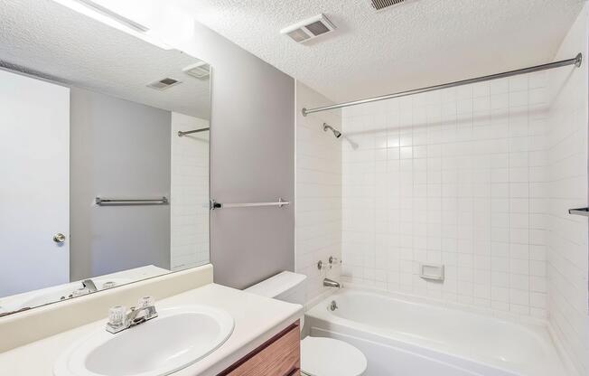 Bathroom with bathtub at Rainbow Ridge Apartments in Kansas City, Kansas
