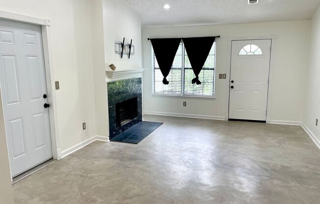Welcome to this stunning 3-bedroom, 2-bathroom home located in the charming Peachtree City, GA.