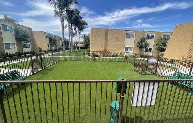 Dog Park and Outdoor Shaded Seating at Whiffle Tree Apartment homes in Huntington Beach, CA.