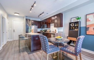kitchen and dining area at the central apartments near downtown minneapolis mn 55408