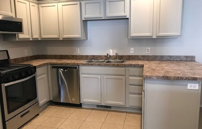 ASK ABOUT OUR MOVE IN SPECIAL!!! -  JUST Remodeled Ozark Duplex with walk-Out Basement - 4 Bedroom 3 Bath 2 Living Areas + 2 Car Garage