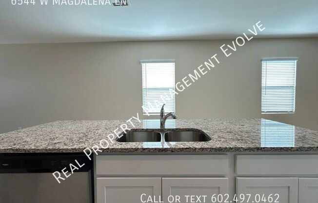 6544 W MAGDALENA LN