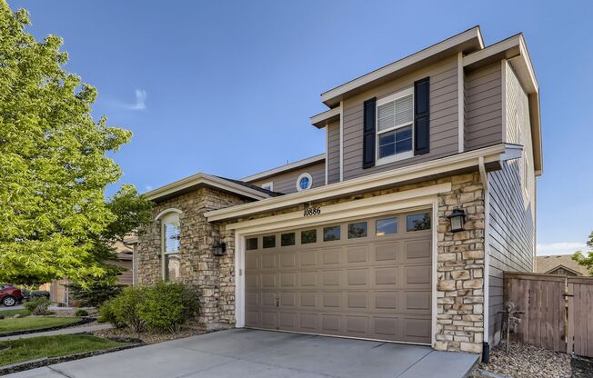 Stunningly Beautiful Highlands Ranch Home Offers over 5300 sqft of Living Space, Gourmet Kitchen & Minutes from Rock Canyon High School.