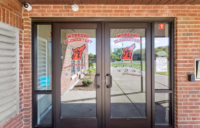 the secured access entry to Muskego School Apartments main building