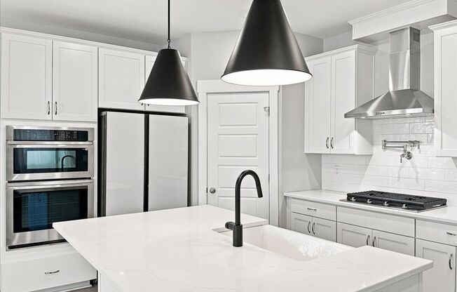 Beautiful 4 Bedroom, 3.5 bath townhome plus additional office/flex space!