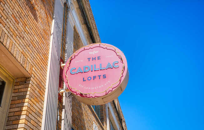 A pink sign that says