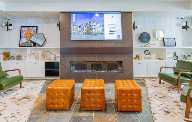 resident lounge with HD tv and fireplace at Bayswater Apartments, Burlingame, 94010