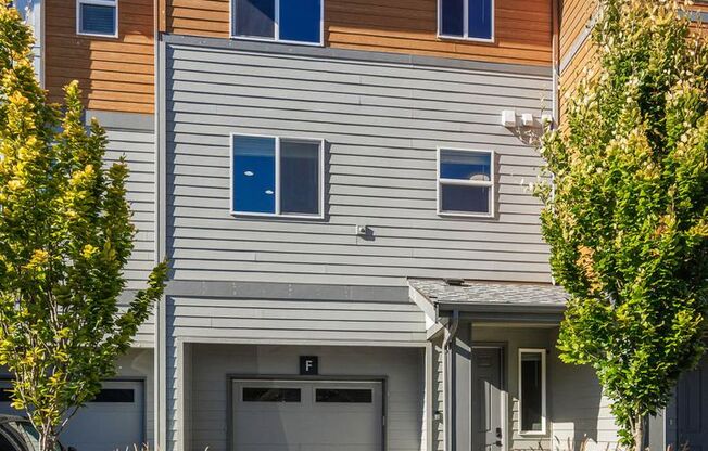 Modern Northshore Townhome with Designer Finishes & 2-Car Garage