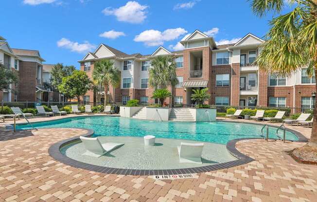 Outdoor Resort Style Pool at Madison on the Meadow Apartments in Stafford, TX 77477