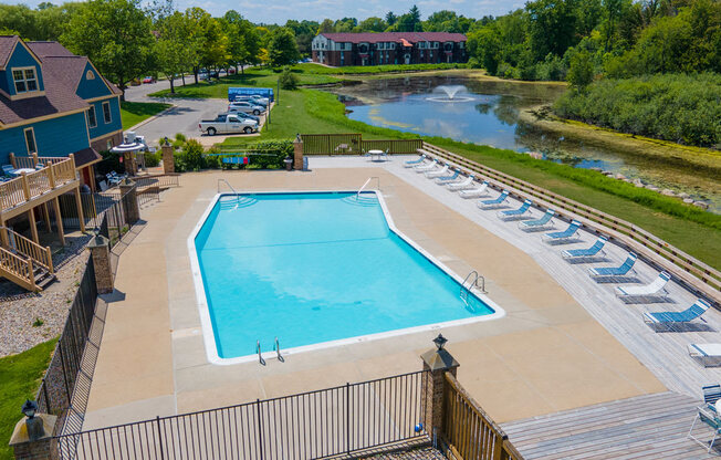 Blue Cool Swimming Pool at Trappers Cove Apartments, Lansing, 48910