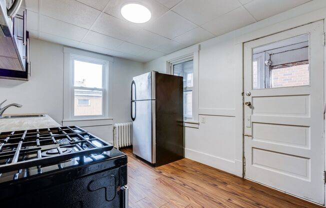 Available NOW - Traditional style 4+ bed home w/ updated appliances & garage!