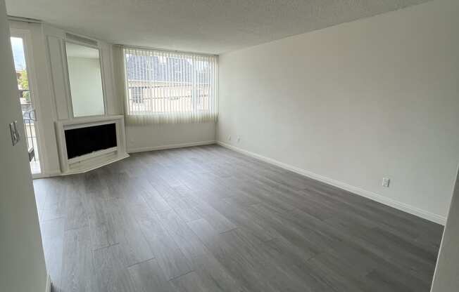 Living Room with Hardwood Floors and Fireplace