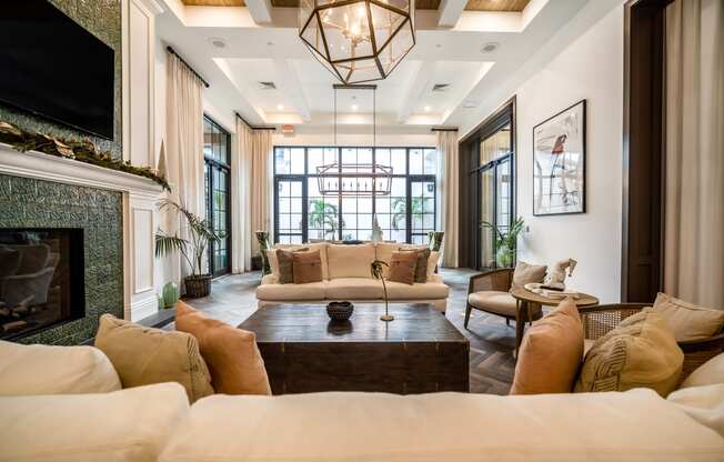 a living room filled with furniture and a fireplace