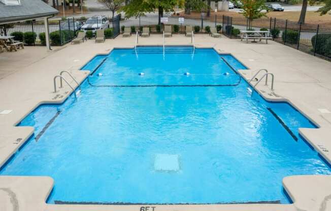 a large pool with blue water in a hotel pool  at Henley, North Carolina