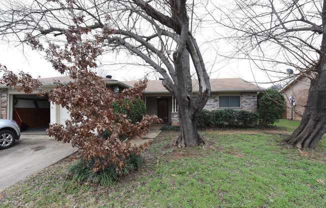 Well-maintained home with a huge yard and covered patio!
