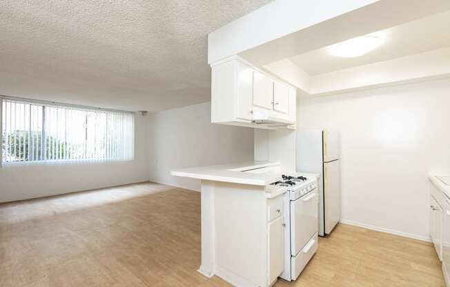 Kitchen with White Appliances and White Cabinets