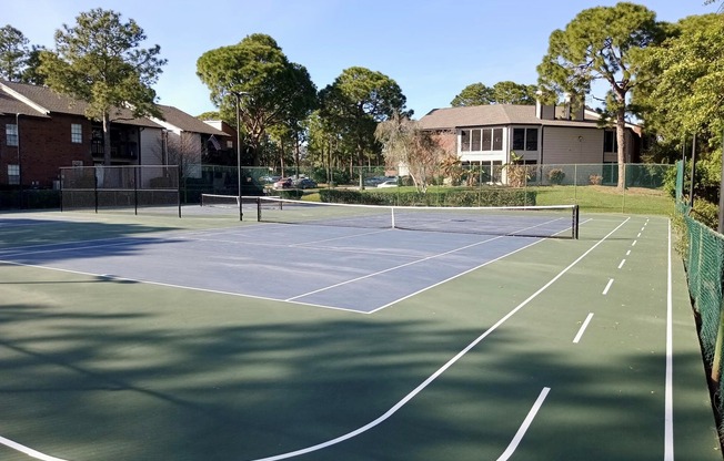 Full size tennis court and two pickle ball courts
