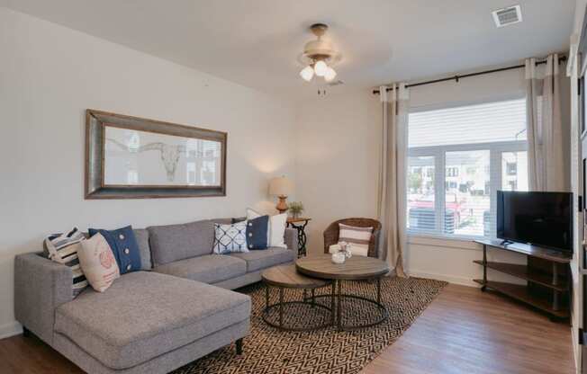 a living room with a couch and a television