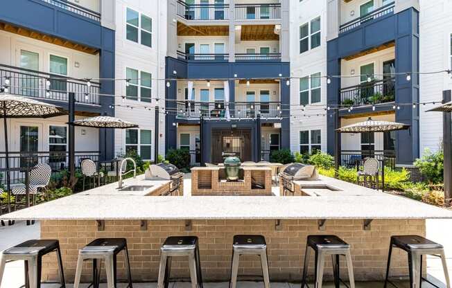 Berkshire Ballantyne outdoor kitchen with grills and al fresco dining