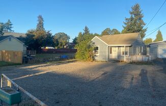 Cozy Single family home with two car garage and controlled access gate