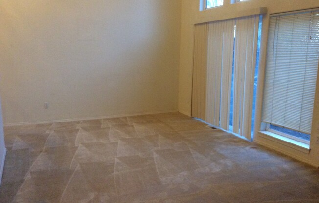 Spacious 3-Bedroom Hillsboro Duplex Featuring High Ceilings, Garage & Green Space