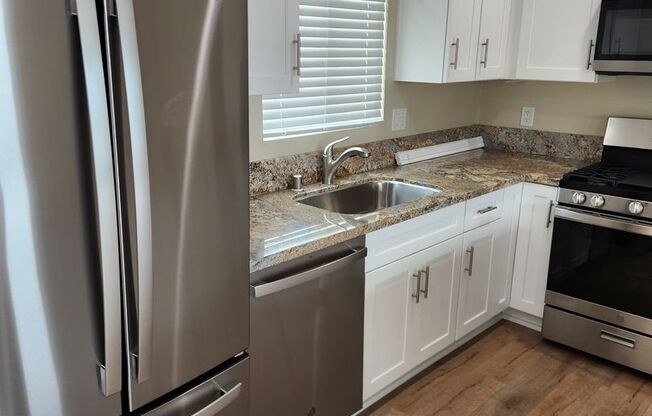 Upper Unit with Ocean View In OB - Complete Remodel