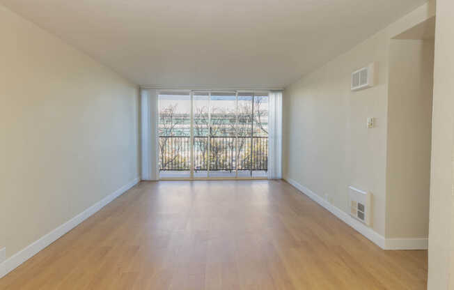 Living Room with Hard Surface Flooring and Balcony