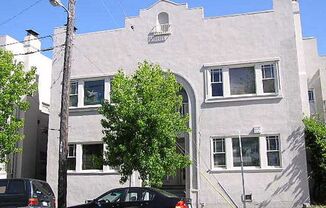 Beautiful, spacious 1-bdr with new windows, great wood floors, and lots of storage space