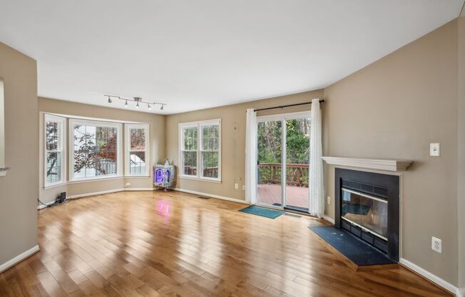 Modern Brick End-Unit Townhome with Stunning Upgrades and Serene Wooded Views