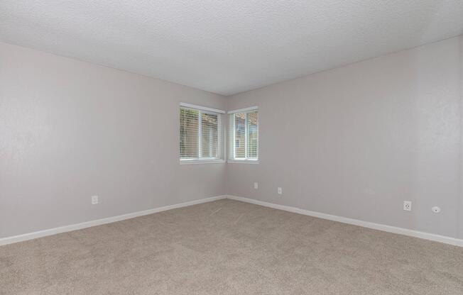 a bedroom with a bed in a room