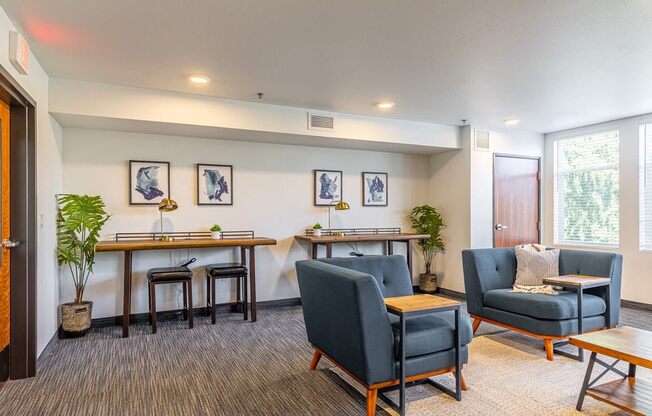 134th street lofts work and study room with desks and seating