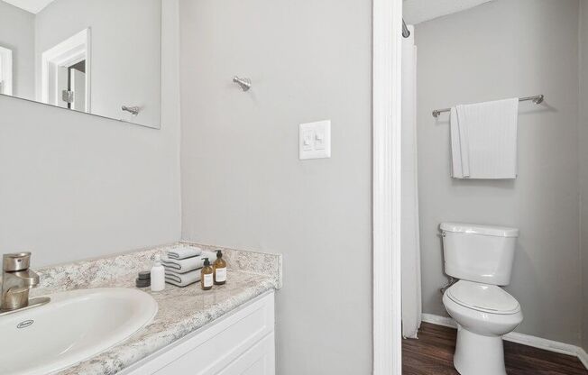 Model bathroom with white vanity